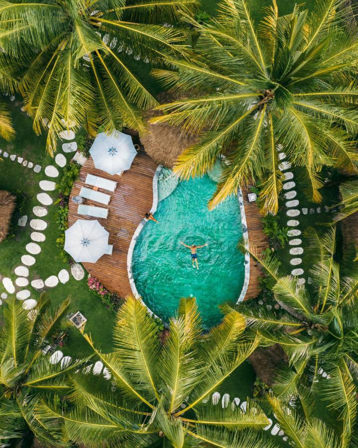 Отель Mana Eco Retreat Kuta  Экстерьер фото