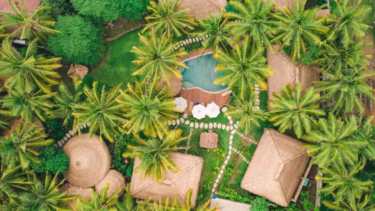 Отель Mana Eco Retreat Kuta  Экстерьер фото