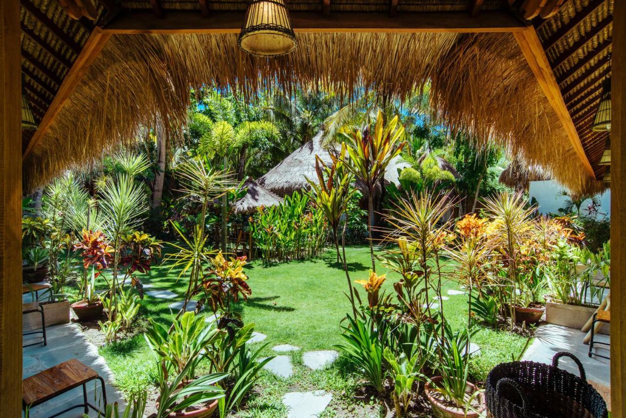Отель Mana Eco Retreat Kuta  Экстерьер фото