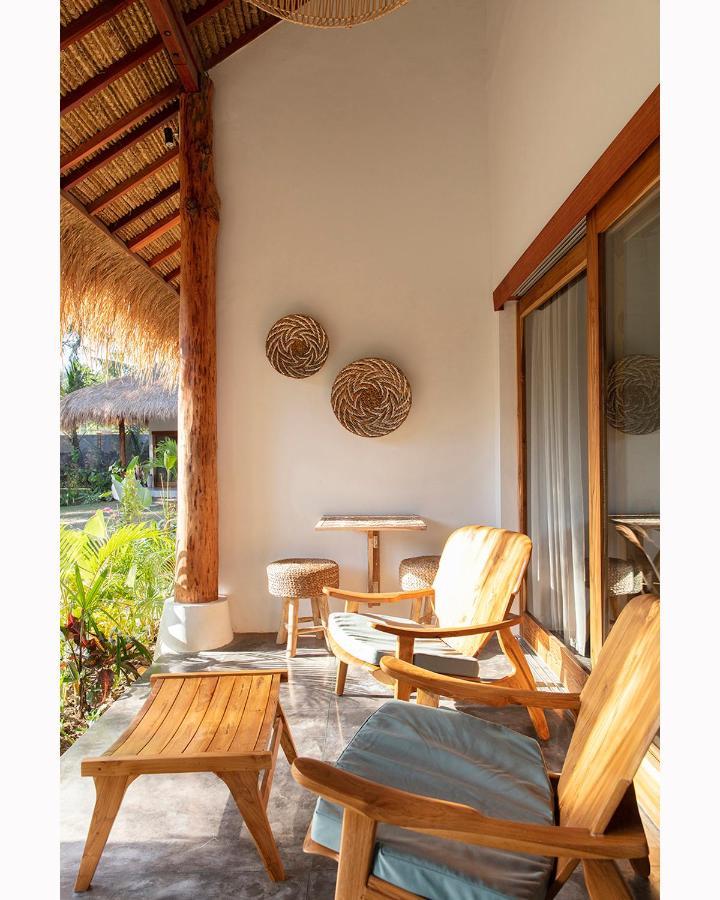 Отель Mana Eco Retreat Kuta  Экстерьер фото