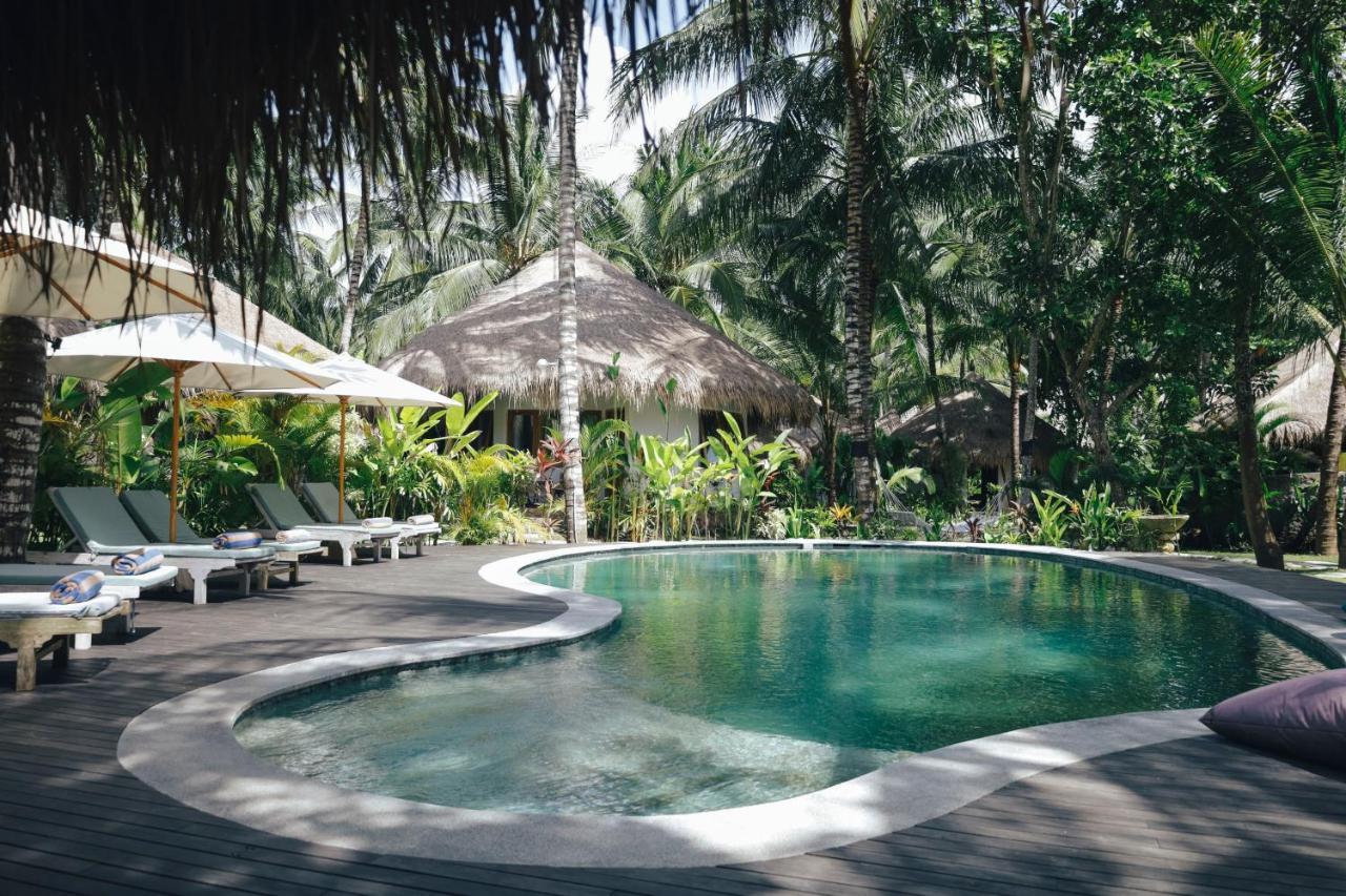 Отель Mana Eco Retreat Kuta  Экстерьер фото