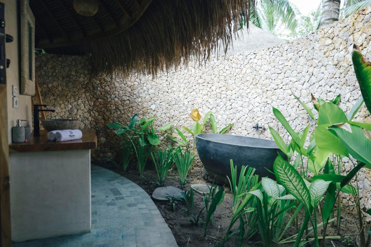 Отель Mana Eco Retreat Kuta  Экстерьер фото