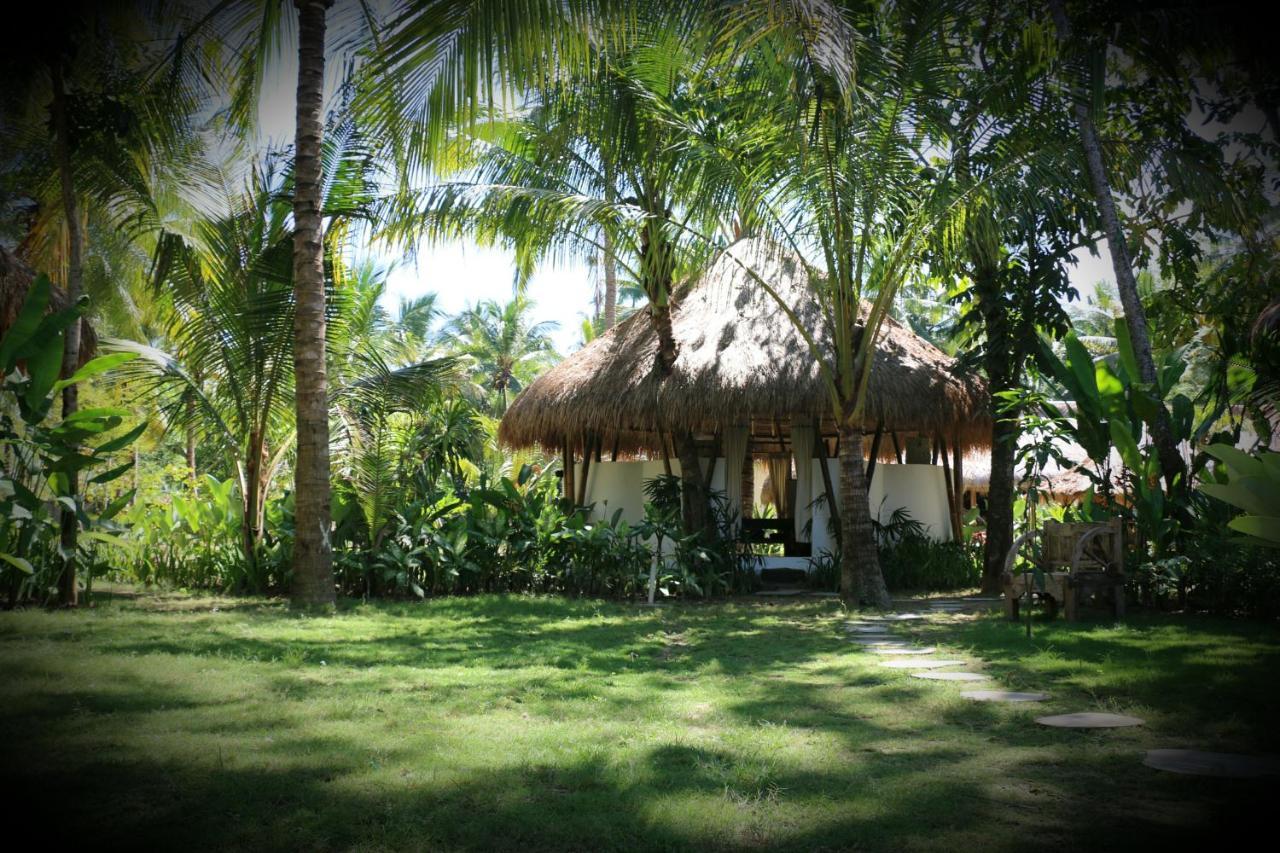 Отель Mana Eco Retreat Kuta  Экстерьер фото